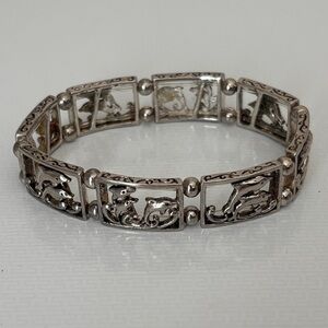 Elegant Silver Plated Stretch Dolphin Bracelet with Intricate Design